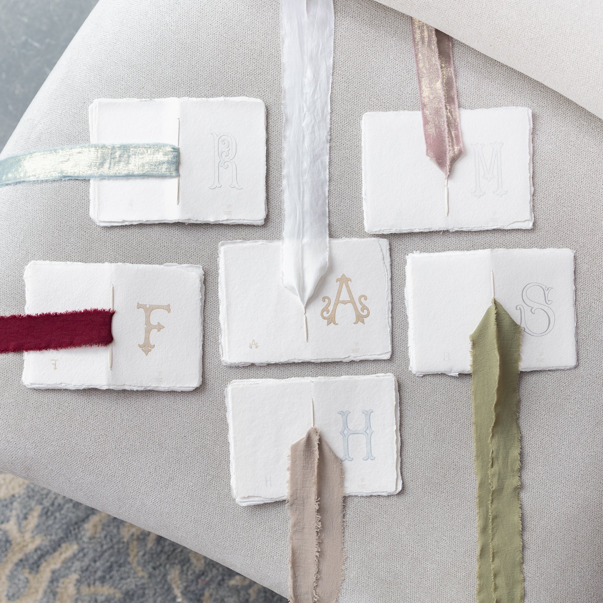 Whispers Reimagined | Monograms